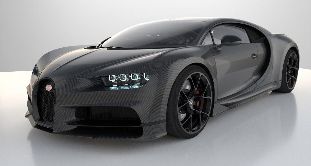 Sportovní vůz Bugatti Chiron s karbonovou karoserií v šedém studiu